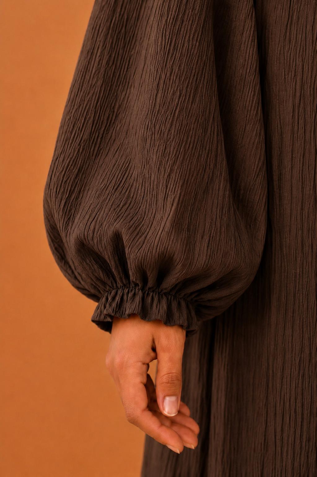 Blusas plisadas asimétricas